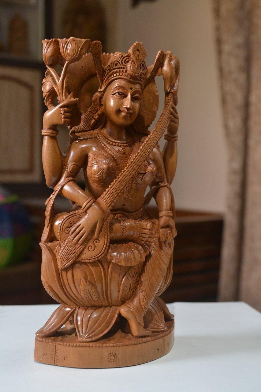 Selling Sandalwood Hand Carved Statue Of Saraswati Indoor Sitting Saraswati Figurine Home Decor Idol For Table Decor And Gifts And Home Decor